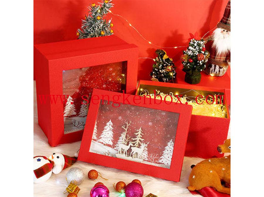 Caja de papel roja de la tapa del árbol de navidad del regalo de la Navidad con la capa visible