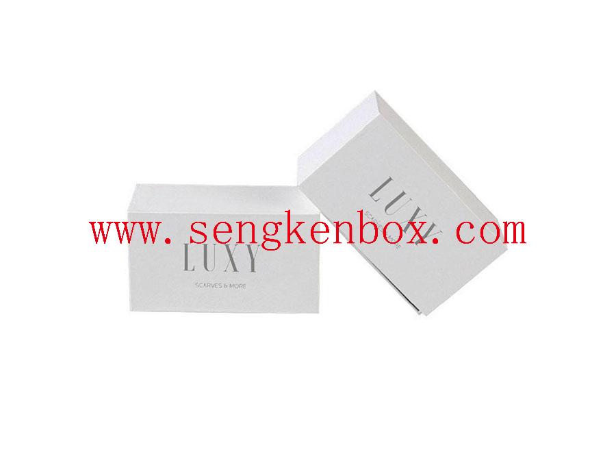 Caja de regalo de papel elegante con cinta